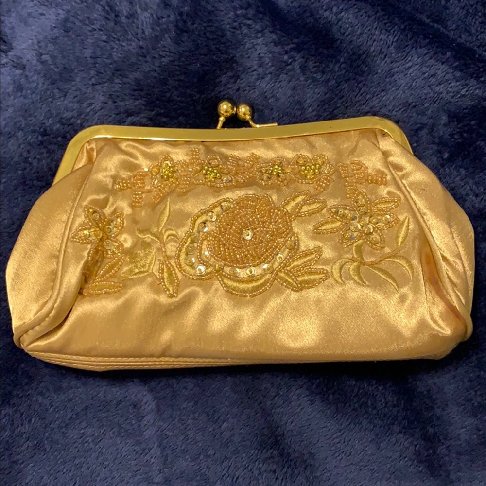 Gold beaded cluch